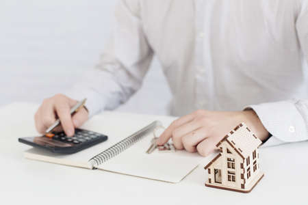 unrecognizable realtor counting office. High quality beautiful photo conceptの写真素材