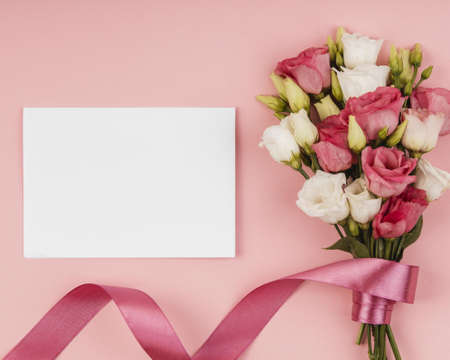 top view beautiful roses bouquet with empty card. High quality beautiful photo conceptの写真素材