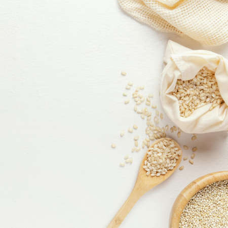 cloth bag with rice wooden spoon. High quality beautiful photo conceptの写真素材