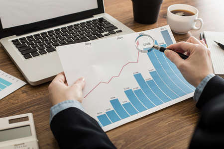 businessman analyzing growth chart office. High quality beautiful photo conceptの写真素材