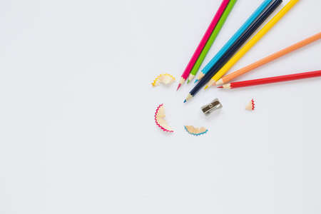 bright pencils near sharpener shaving. High quality beautiful photo concept