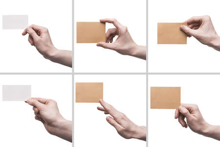 crop hands with visiting cards. High quality beautiful photo concept