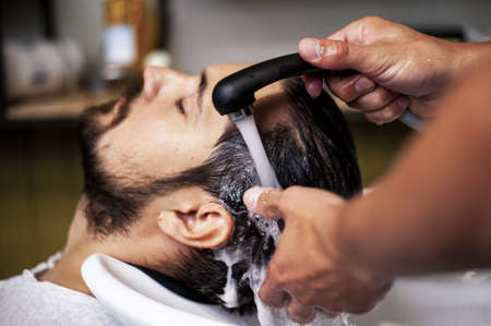 close up man getting hair wash 2. High quality beautiful photo conceptの写真素材