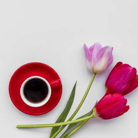 bunch fresh flowers near cup coffee. High quality beautiful photo conceptの写真素材