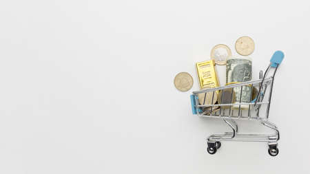 shopping cart filled with money copy space2. High quality beautiful photo conceptの写真素材