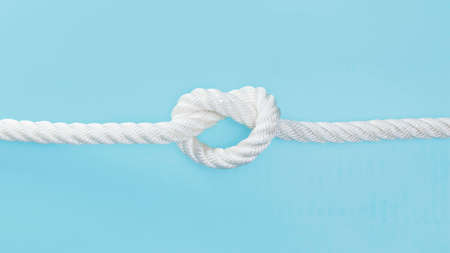 white solid rope with knot. High quality photoの写真素材
