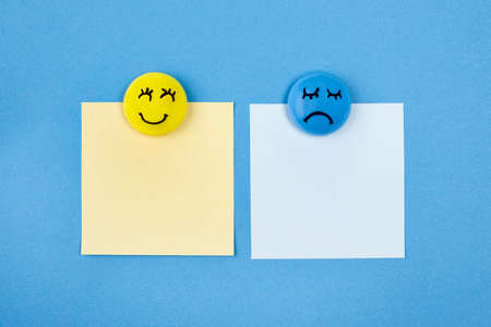 flat lay faces with emotions sticky notes blue mondayの写真素材