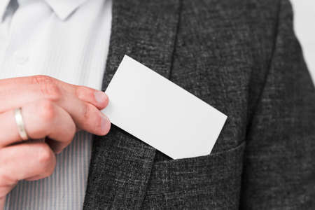 business people showing blank business cardの写真素材