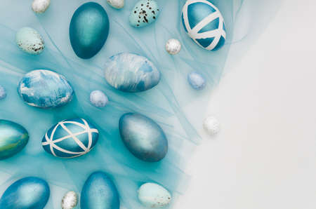 flat lay painted easter eggs with copy spaceの写真素材