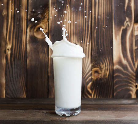pouring milk out glass. High quality photoの写真素材