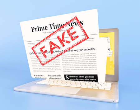 laptop with fake news webpage. High quality beautiful photo conceptの写真素材
