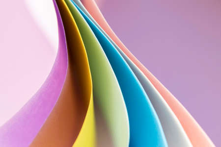 curved layers colored papers empty background. High quality photoの写真素材