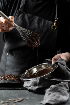 pastry chef preparing chocolate cake. High quality photoの写真素材