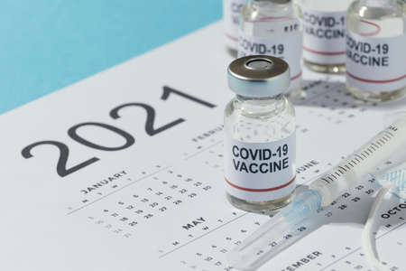 minimal vaccine bottles composition calendar. High quality photoの写真素材