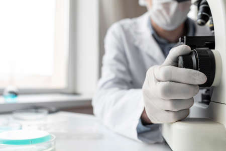 close up hand wearing protection glove. High quality photoの写真素材