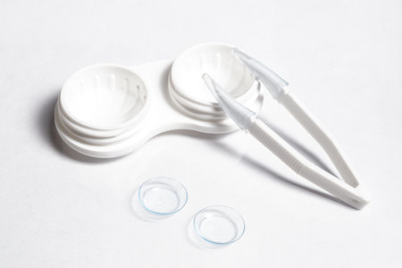 high angle transparent contact lenses with case tweezers. High quality beautiful photo conceptの写真素材