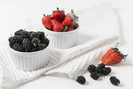 high angle strawberries mulberries bowls. High quality beautiful photo conceptの写真素材