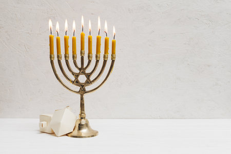 hebrew menorah with candles burning. High quality beautiful photo conceptの写真素材
