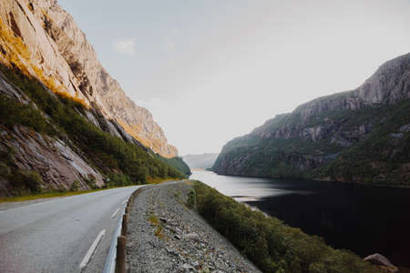 modern road surrounded by mountains. High quality photoの写真素材