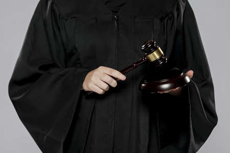 front view female judge with gavel. High quality beautiful photo concept