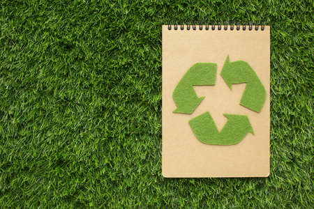 ecological notebook with recycle sign. High quality beautiful photo conceptの写真素材