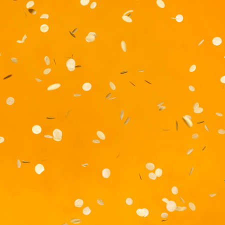 arrangement golden party confetti orange wall. High quality photoの写真素材