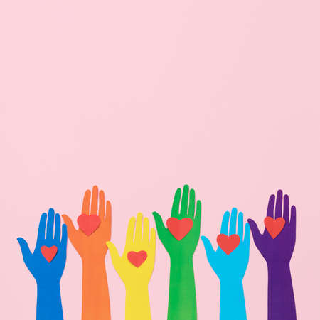 top view diversity composition different colored paper hands with copy space. High quality photoの写真素材