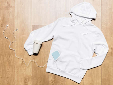 white hoodie with headphones. High quality photo