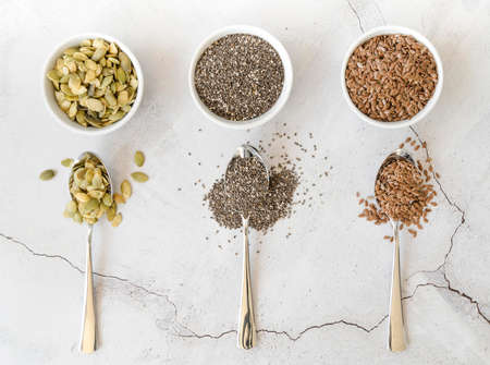bowls with various seeds spoons. High quality photoの写真素材