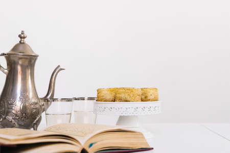 ramadan composition with quran arab food. High quality photoの写真素材