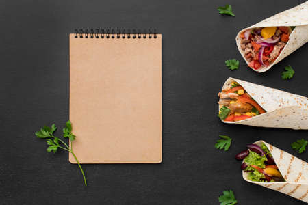 top view tasty tortilla wraps with parsley meat. High quality photoの写真素材