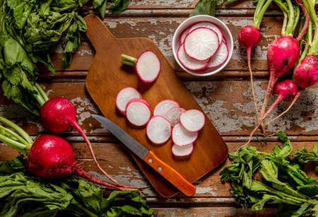 top view radishes with knife. High quality photoの写真素材