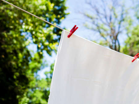 close up white sheet drying line. High quality photoの写真素材