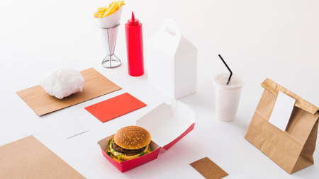 fast food disposal cup sauce bottle parcel white background. High quality photoの写真素材