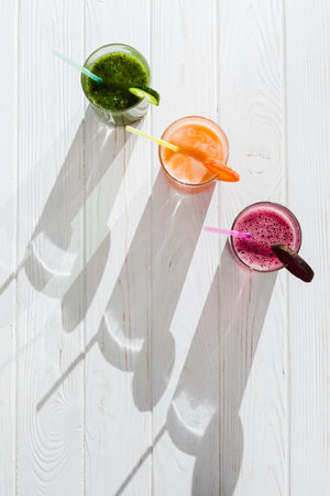 fresh healthy juices with straws. High quality photoの写真素材