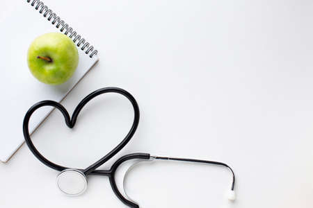 front view green apple stethoscope. High quality photoの写真素材