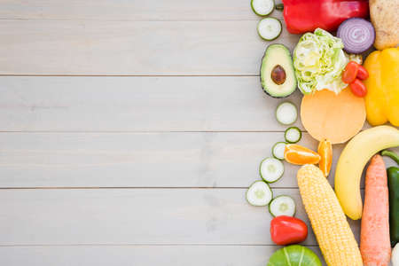 colorful vegetables wooden desk backdrop. High quality photo
