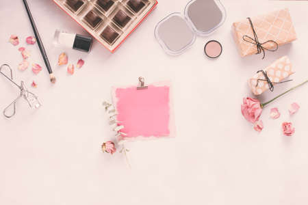 blank paper with gift boxes roses cosmetics. High quality photoの写真素材