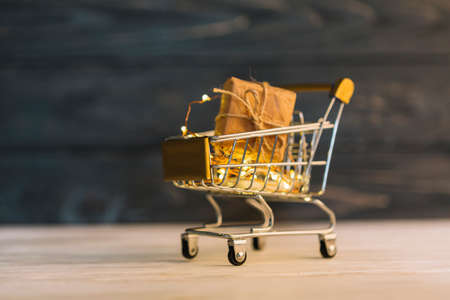 small grocery cart with gift box. High quality photoの写真素材