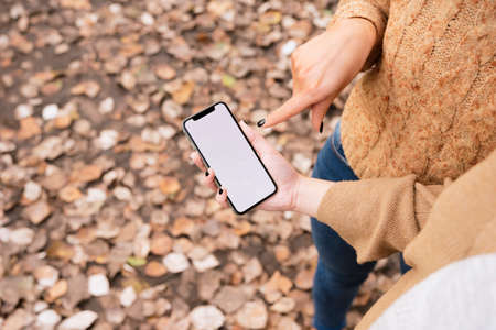 close up two young women looking phone. High quality photo