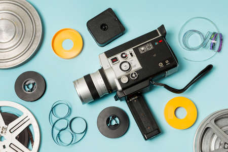 elevated view film reel film strips camcorder blue background. High quality photoの写真素材