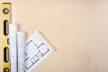 flat lay architectural plans desk with copy space. High quality photoの写真素材