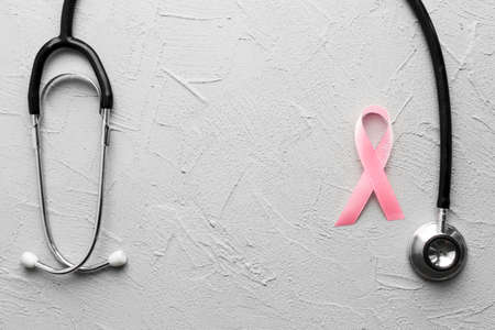 pink ribbon black stethoscope plaster. High quality photoの写真素材