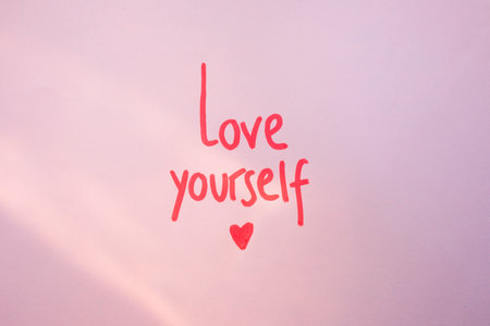 love yourself inscription purple table. High quality photoの写真素材