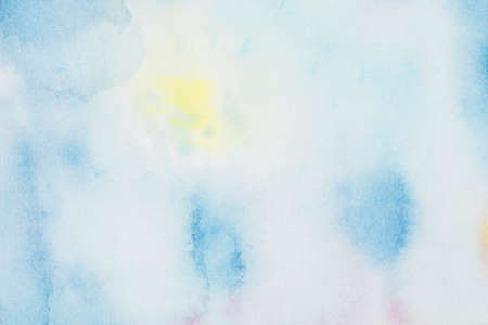 blue yellow spots paints white paper. High quality photoの写真素材