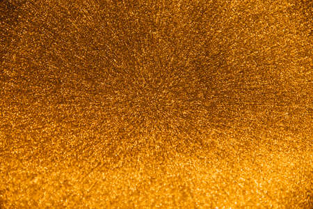 from droplets golden water. High quality photoの写真素材