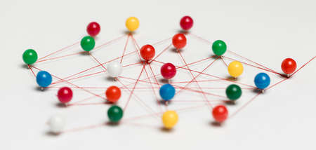 colourful pushpins with thread route map. High quality photo
