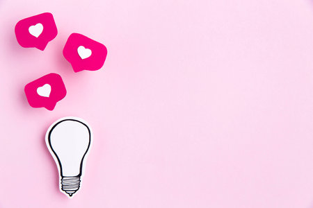 paper ligh bulb with heart icon. High quality photo