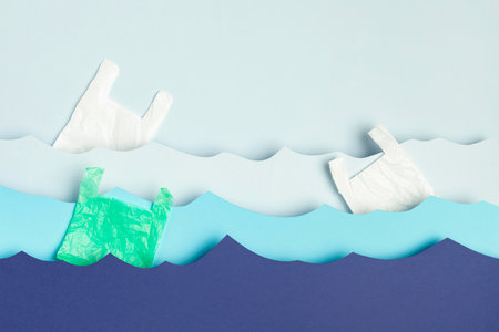 top view paper ocean waves plastic bags. High quality photo