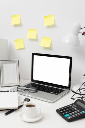 side view desk arrangement with post its wall. High quality photoの写真素材
